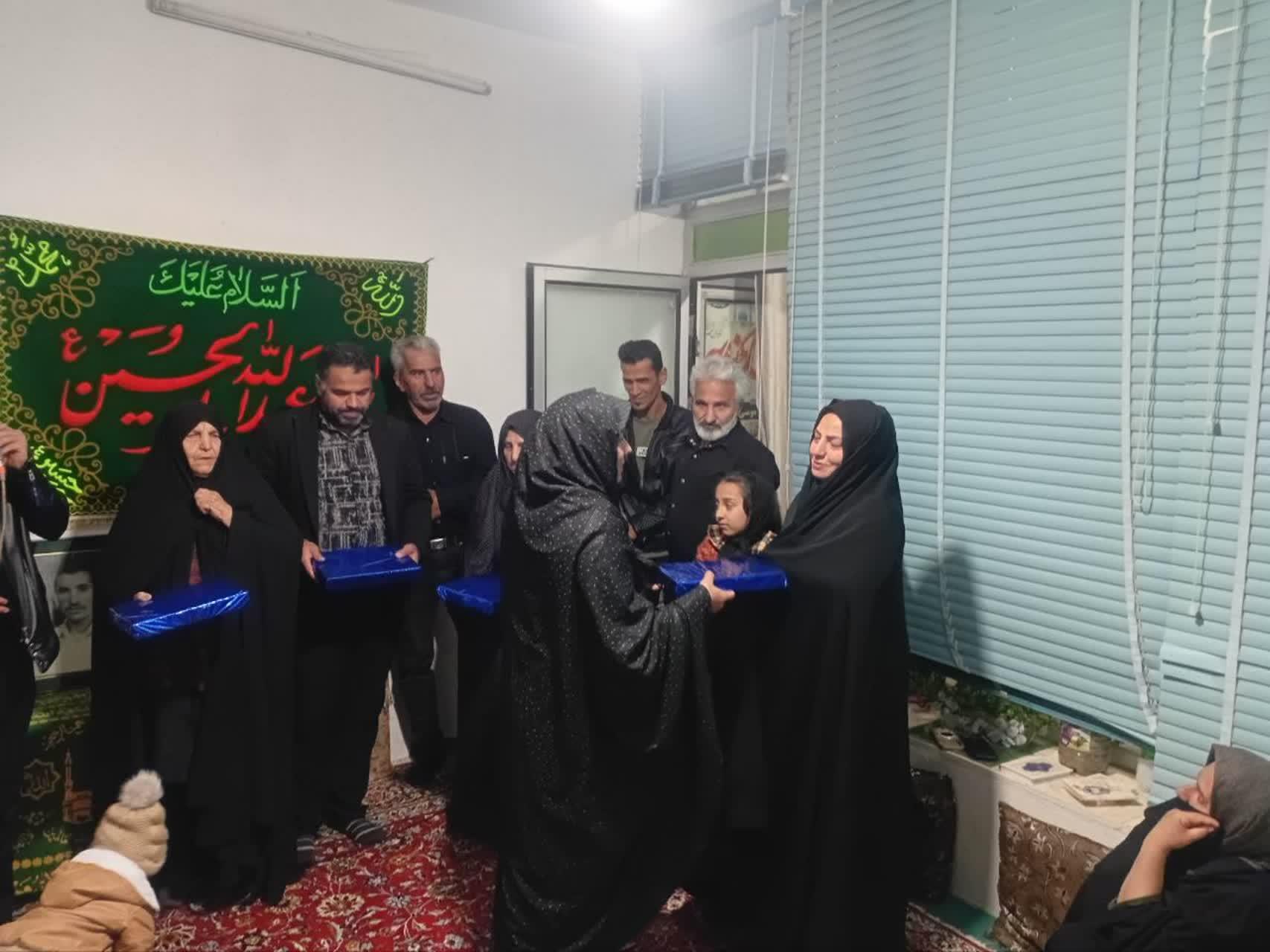 تجلیل از خانواده شهید علیرضا احمدی 